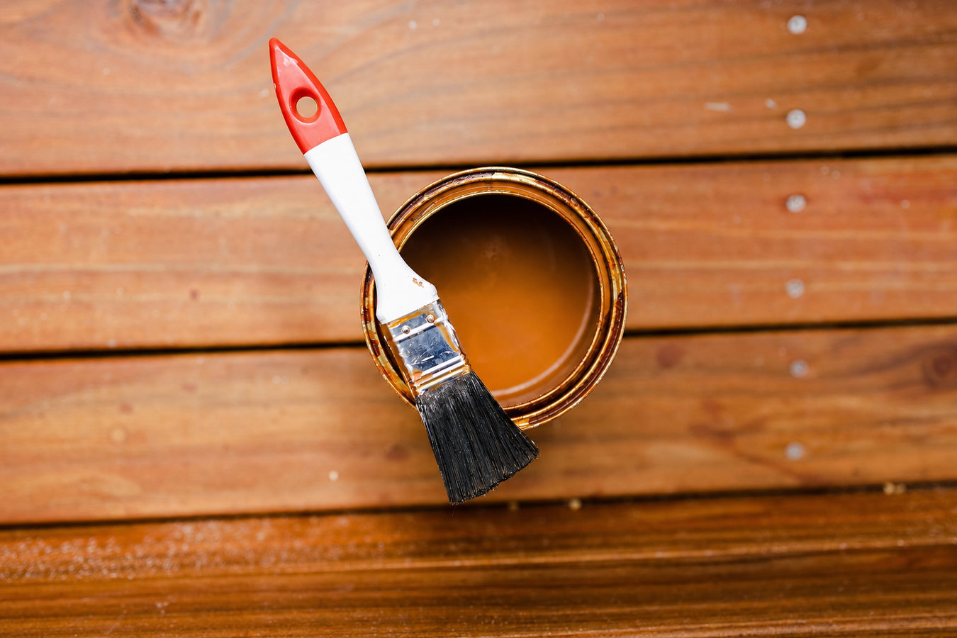 Deck staining and sealing